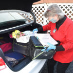 Meals on Wheels delivery being loaded